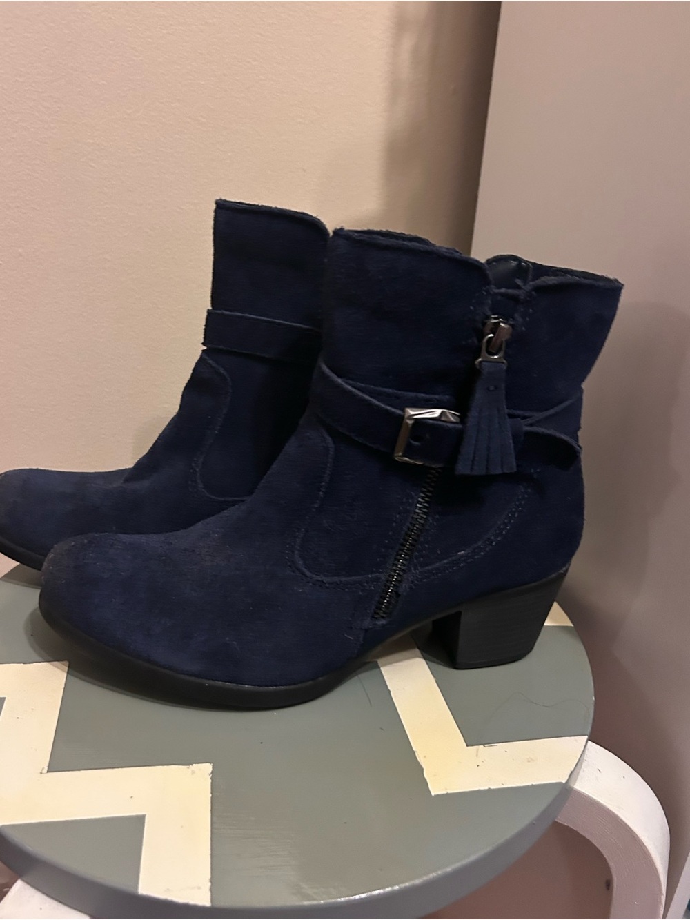 Earth Origins women’s Tori Navy Suede Ankle Booties with Tassel and Buckle